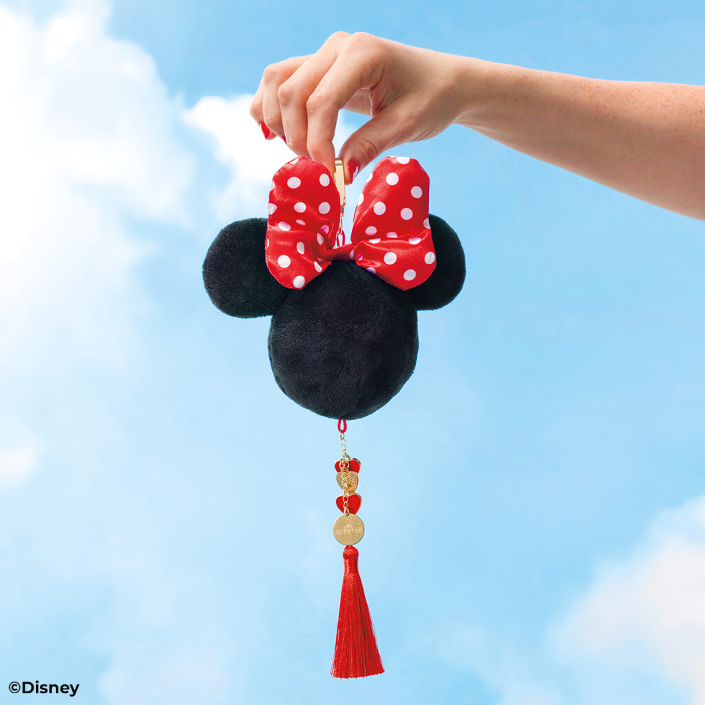 Scentsy's Minnie Mouse Charm clip. Black minnie head icon with her signature red bow with white polka dots.