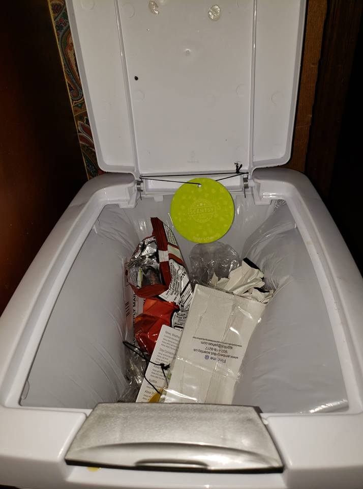 Bright green Scentsy Scent Circle attached inside a lidded trash can to eliminate odors. Clever use for Scentsy air fresheners in kitchens or small spaces