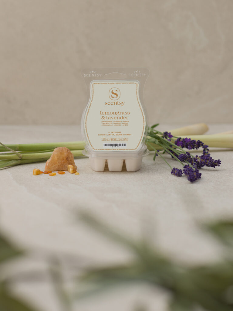 Scentsy Lemongrass & Lavender dye-free wax bar from the Inspire Collection, styled with lavender sprigs and lemongrass for a natural, calming look.