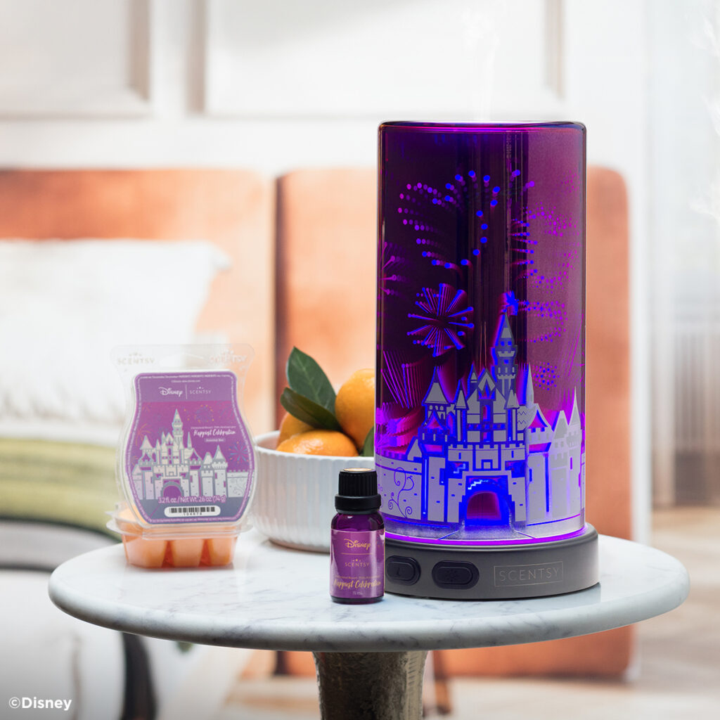 Scentsy Disneyland Resort 70th Anniversary collection featuring the Sleeping Beauty Castle diffuser and Happiest Celebration scent.