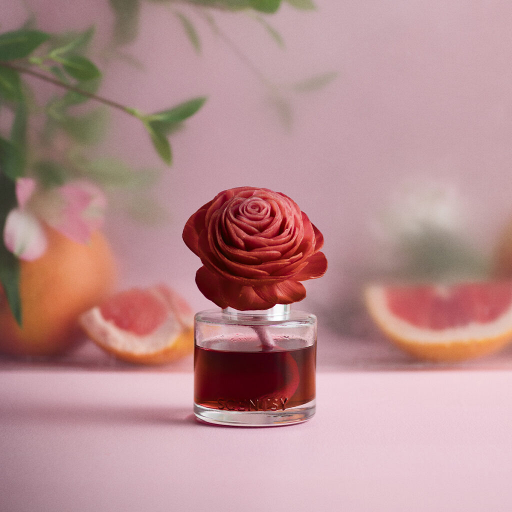 Scentsy fragrance flower in a Valentine’s Day color palette, styled with romantic accents and soft pink background.