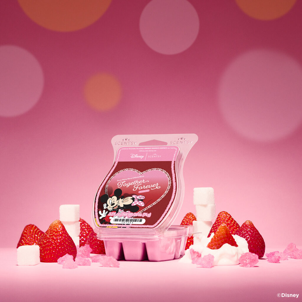Disney Scentsy Together Forever wax bar inspired by Mickey and Minnie Mouse, styled with strawberries and soft pink tones.