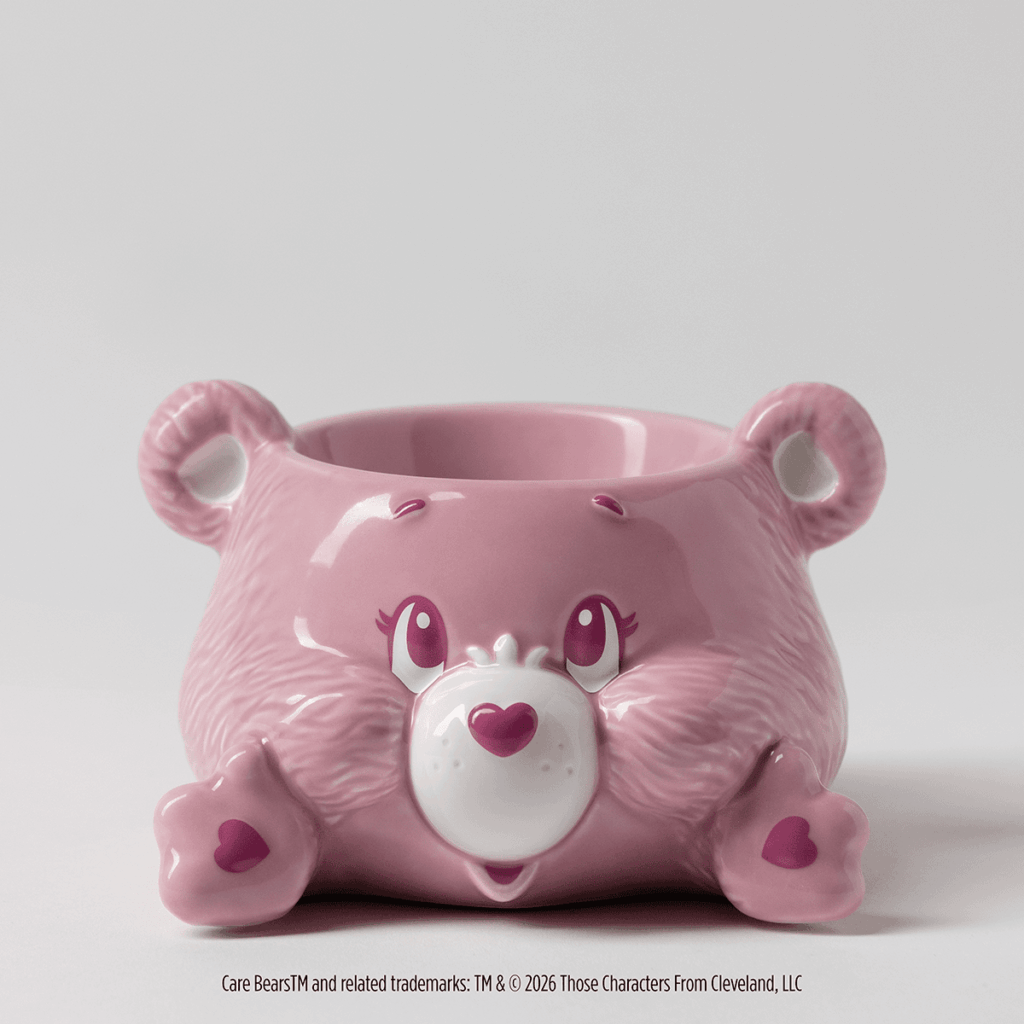 Cheer Bear Scentsy warmer from the Care Bears collection in pink with heart nose and cheerful bear expression.