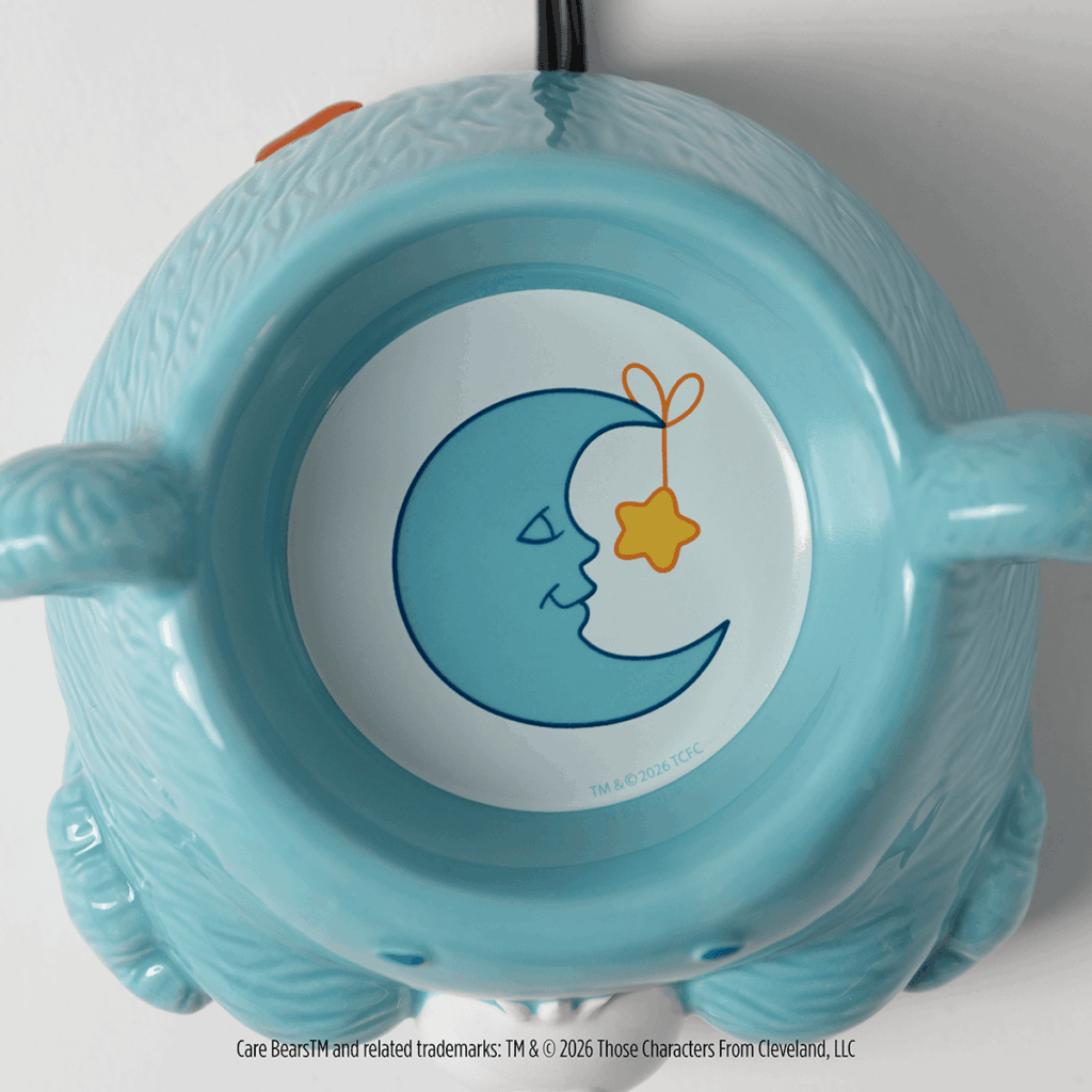 Top view of Bedtime Bear Scentsy warmer showing the crescent moon and star design inside the wax dish.