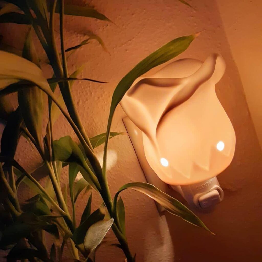 scentsy Tea Rose mini warmer in an outlet for the Tea Rose Mother's Day bundle