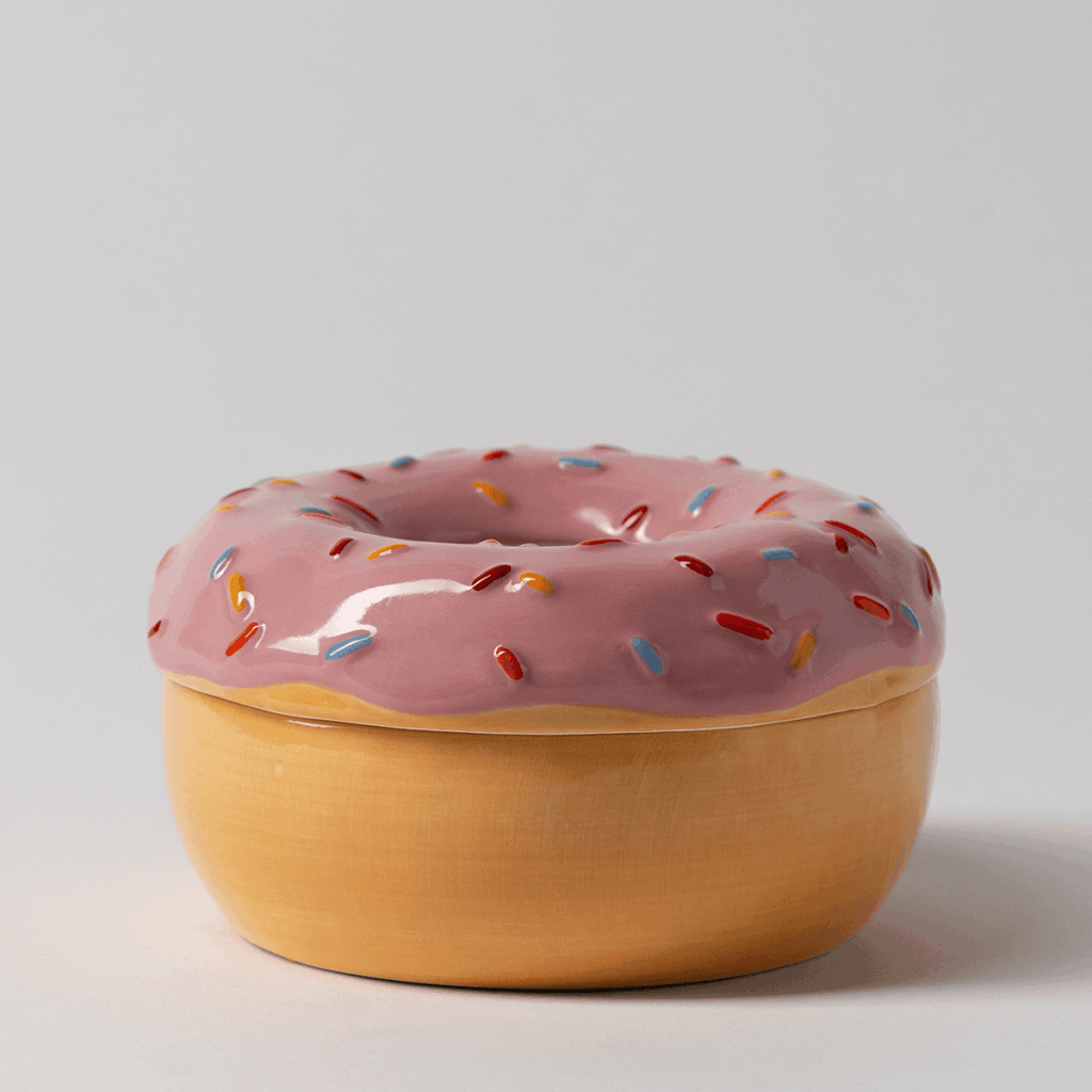 Scentsy Pink Sprinkle donut warmer. with red, blue and tan sprinkles