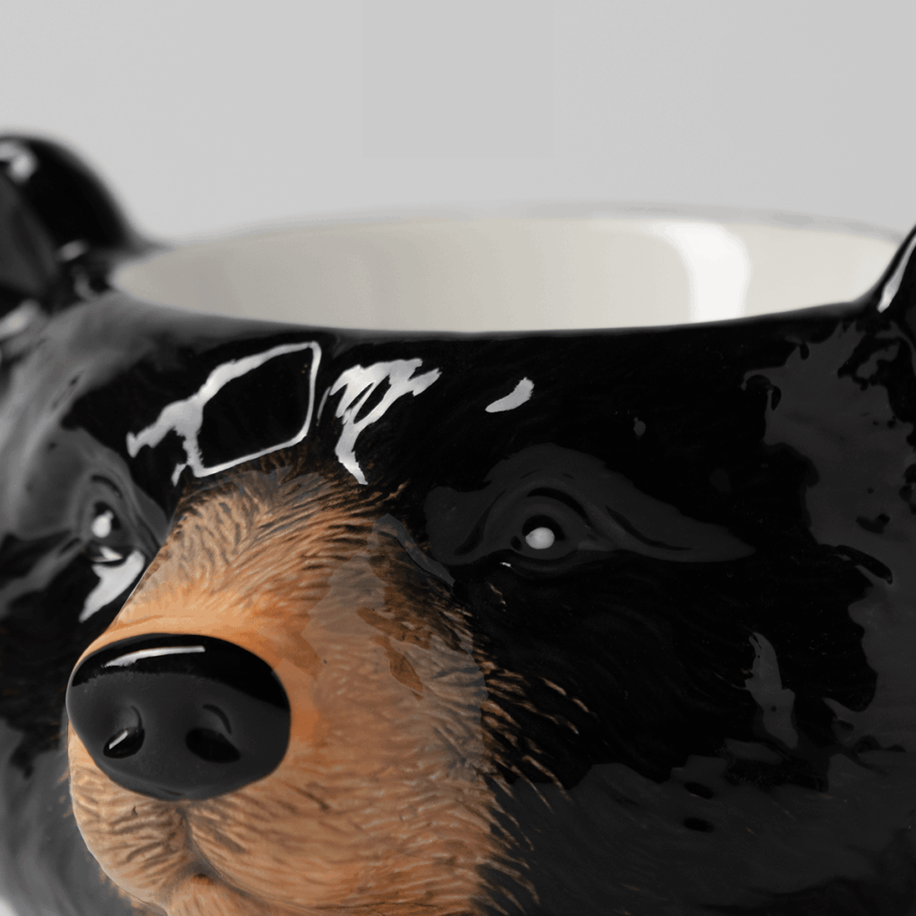 Close-up detail of the Blackwood Bear Scentsy Warmer highlighting the bear's face and glossy ceramic finish.