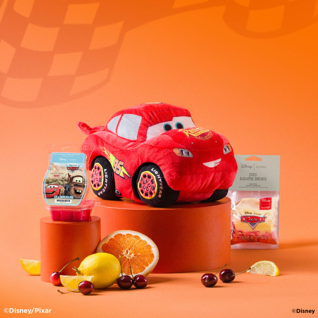 Disney Pixar Cars Scentsy collection featuring the Lightning McQueen Buddy, Radiator Springs Scentsy Bar, and Radiator Springs Scent Pak.