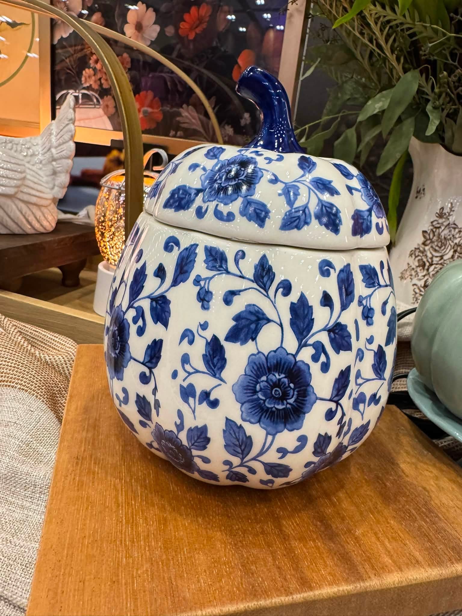 Blue and white floral pumpkin, Indigo Vine Scentsy Warmer featuring a porcelain-inspired floral pattern with a dark blue stem.