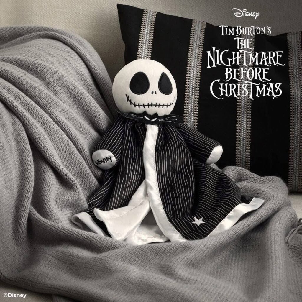 Disney Jack Skellington Scentsy Blankie Buddy inspired by The Nightmare Before Christmas, featuring Jack wrapped in a soft black and white blanket.