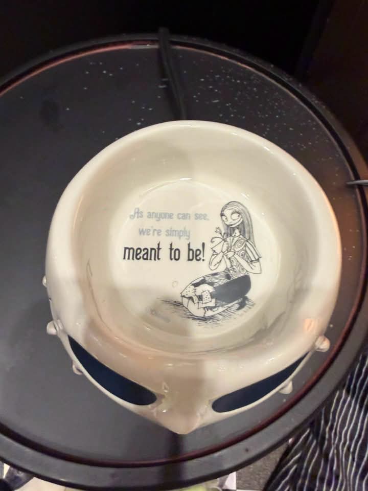Top view of the Disney Jack Skellington Warm Fuzzies Scentsy Warmer dish featuring Sally and the phrase, "As anyone can see, we're simply meant to be!"