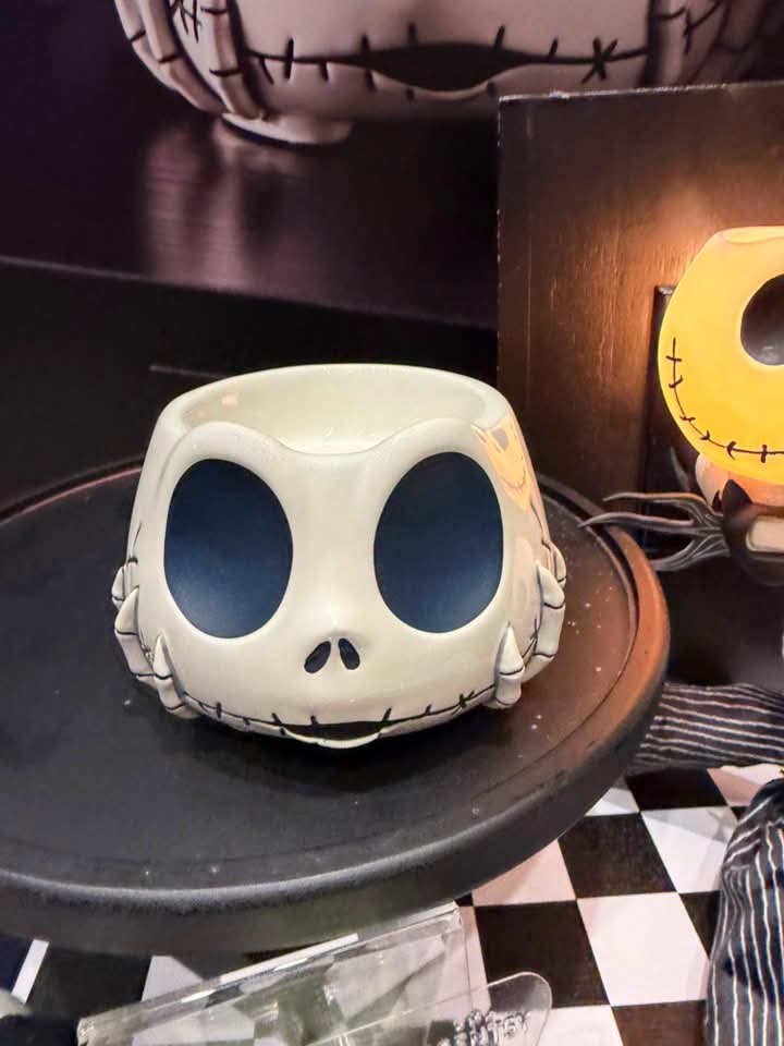 Disney Jack Skellington Warm Fuzzies Scentsy Warmer inspired by Tim Burton's The Nightmare Before Christmas, featuring Jack's smiling face.
