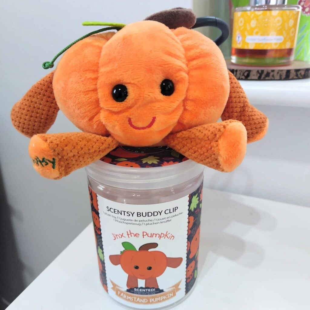 Jinx the Pumpkin Scentsy Buddy Clip with a smiling pumpkin face and Farmstand Pumpkin fragrance.