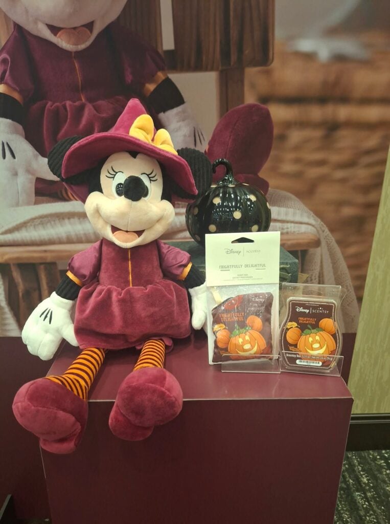 Disney Minnie Mouse Happy Halloween Scentsy Buddy dressed in a witch costume with the Frightfully Delightful Scent Pak and Frightfully Delightful Scentsy Bar.