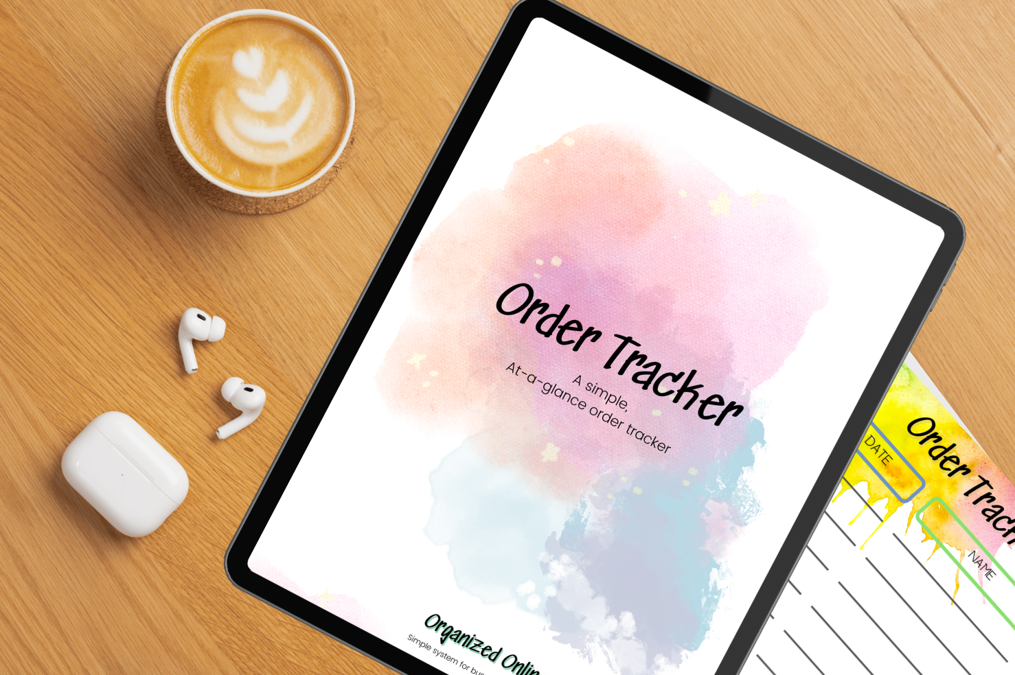 Digital order tracker printable shown on a tablet, linking to Organized Online Entrepreneur's order tracker download.