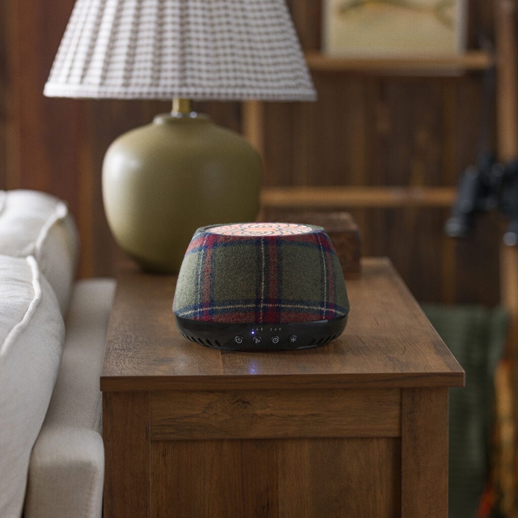 Plaid Scentsy Air Quad fragrance system with a green tartan-inspired design featured in the August 2026 Cozy Cabin Scentsy Edit.