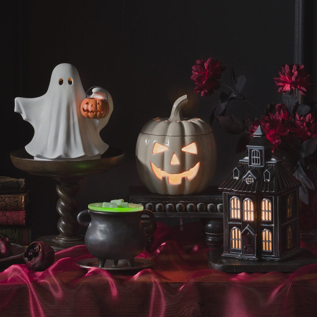 Scentsy Halloween home fragrance products from the September Edit including the Black Luna candle, reed diffusers, fragrance flower, Hocus Pocus warmer and Halloween scent circles.