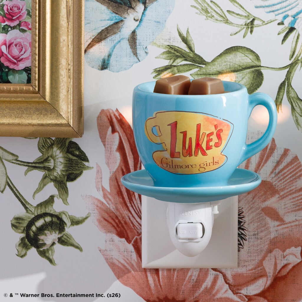 Gilmore Girls Luke's Coffee Mug Scentsy Mini Warmer styled as a blue Luke's mug with wax in the dish.
