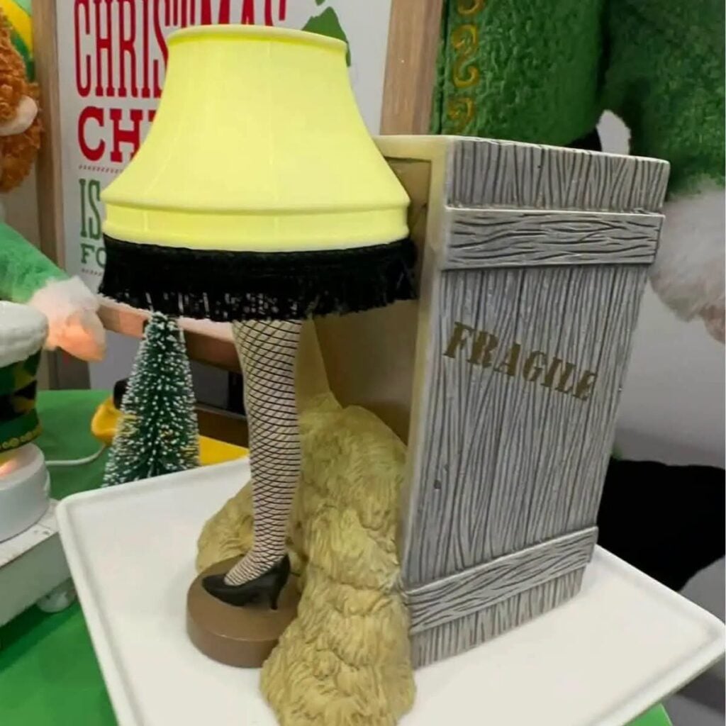 A Christmas Story Fra-Gi-Le Scentsy Warmer featuring the leg lamp displayed beside its Fragile shipping crate.