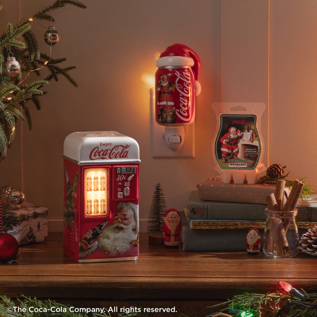 Coca-Cola Scentsy holiday collection featuring a vintage red Coca-Cola vending machine warmer with Santa artwork.