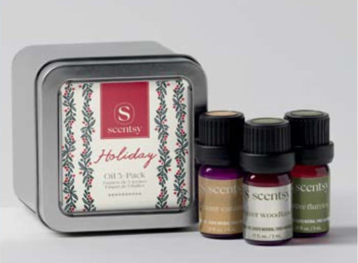 Scentsy 2026 Holiday Oil Trio featuring three seasonal essential and natural oil blends in a holiday gift tin