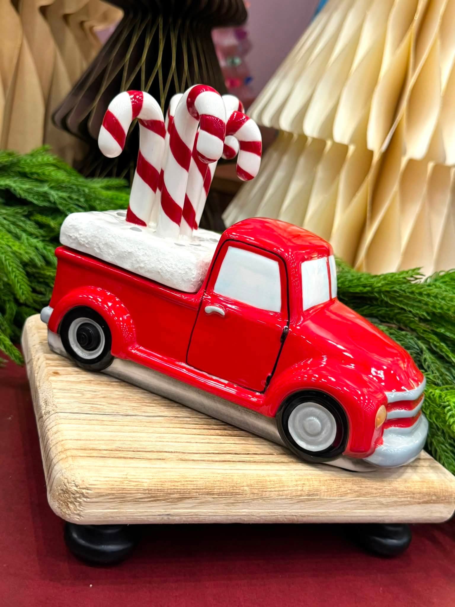 Scentsy Retro Red Truck warmer with a red vintage pickup truck and candy cane topper in the truck bed.