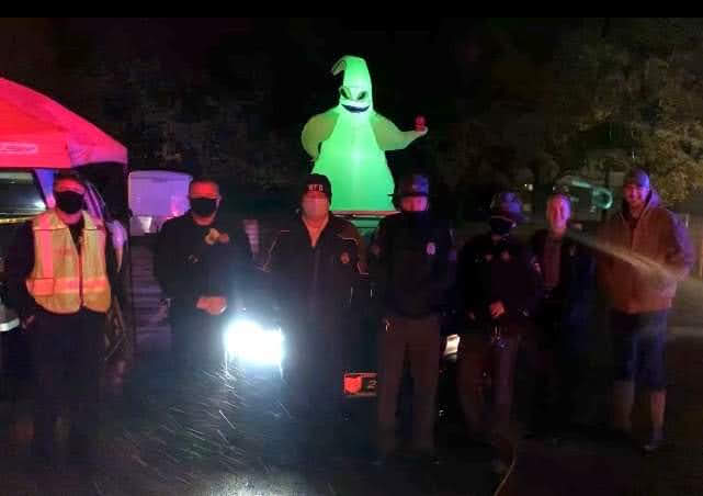 First year of our Trunk or Treat event in 2020 with law enforcement and Halloween decorations at night.