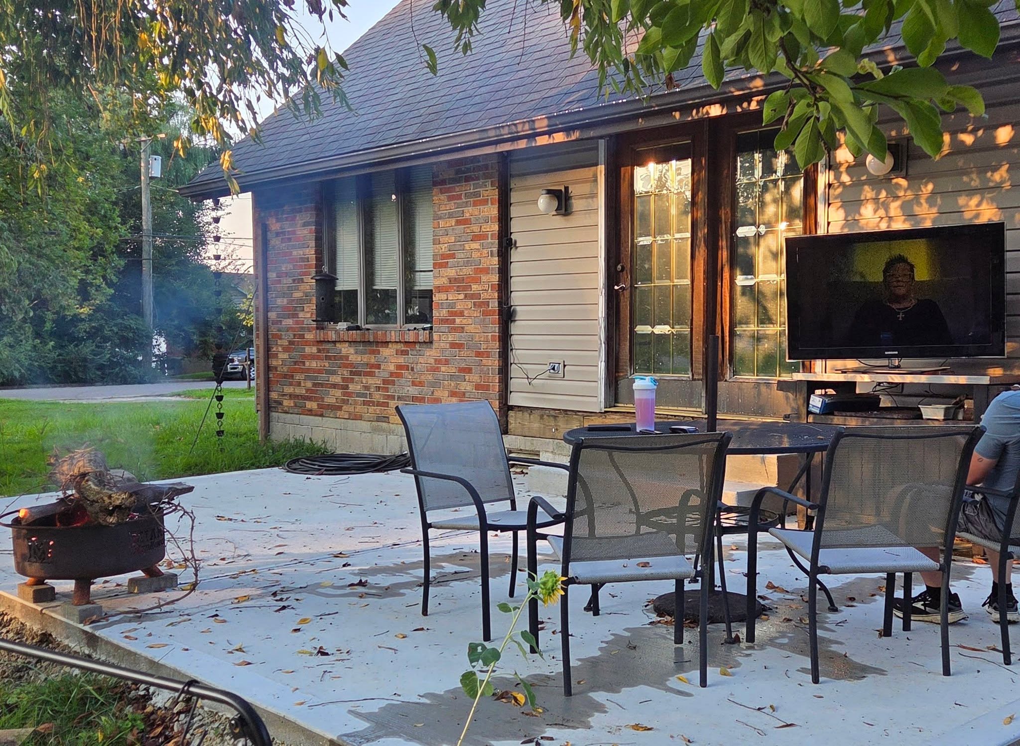 Our hillbilly outdoor living room. 
Kidding, kinda.
But it is nice to have a fire and watch tv and be outside